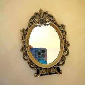 Antique Italian Small brass frame oval makeup mirror